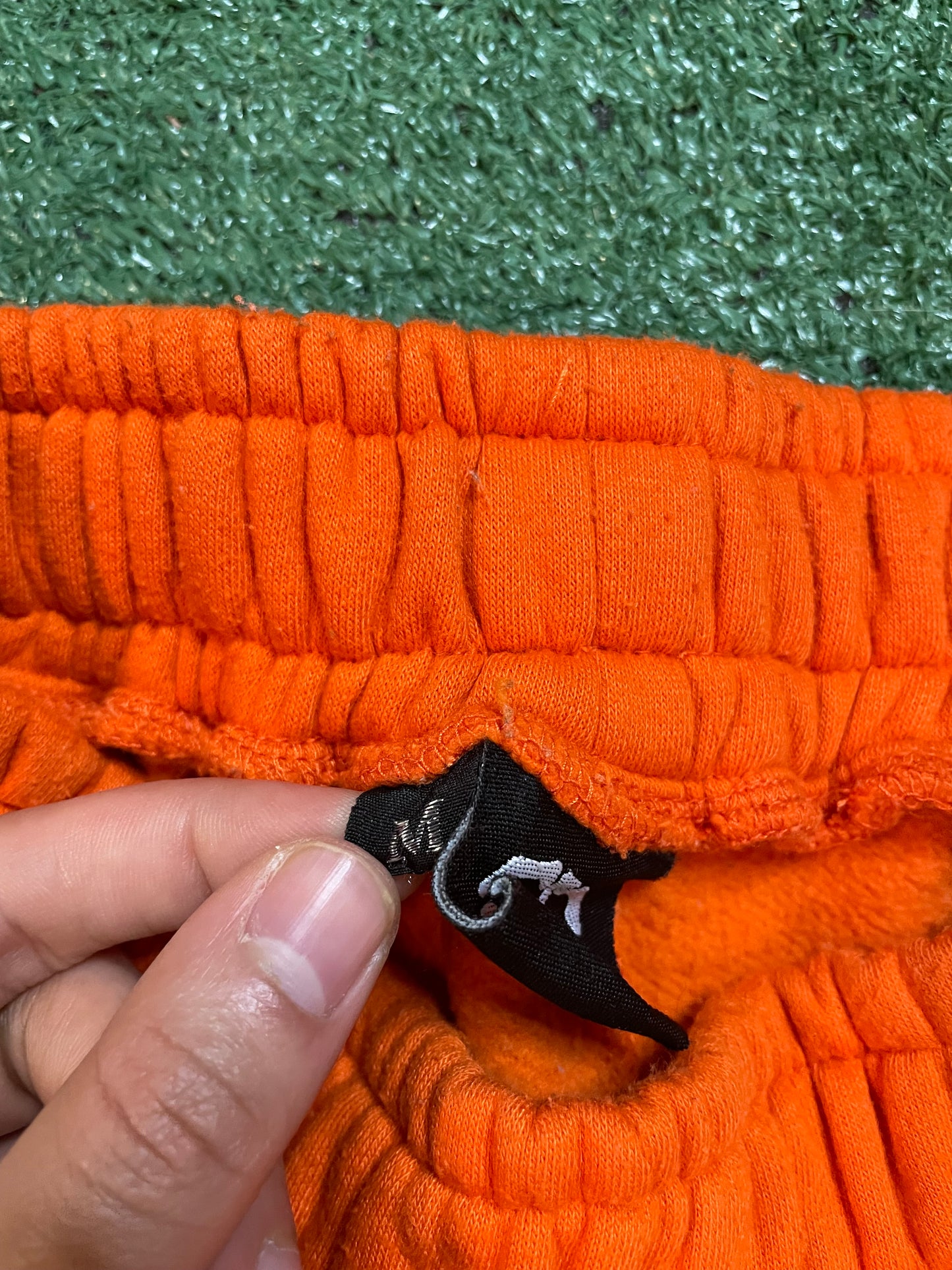 Orange embroidered sweatpants