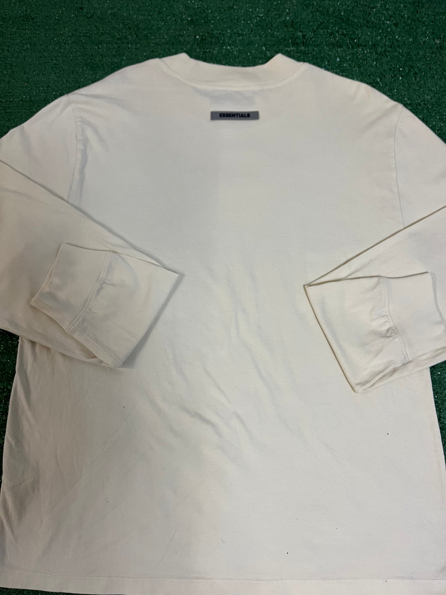 Fear of God Essentials long sleeve buttercream tee