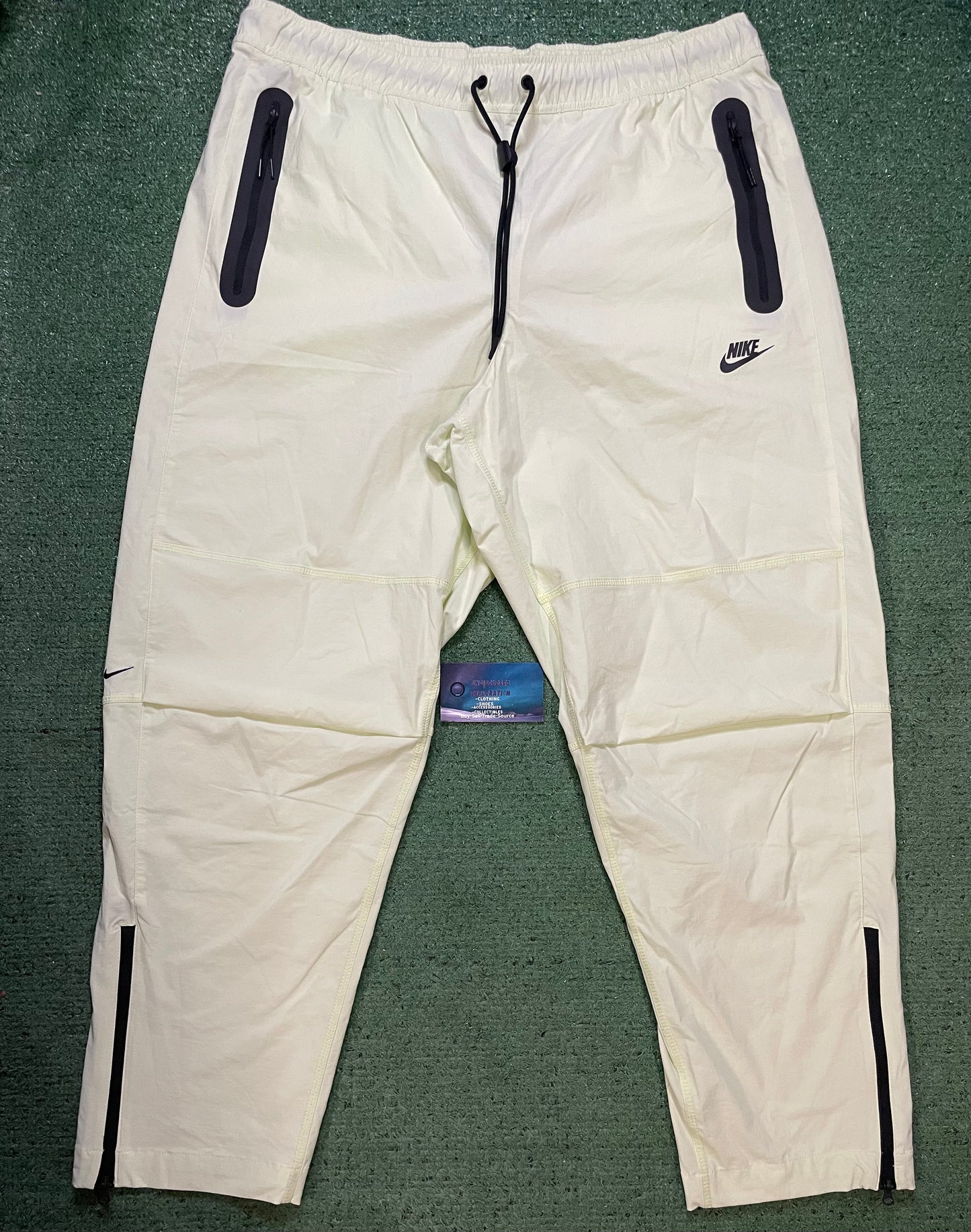 Nike tech woven lime pants