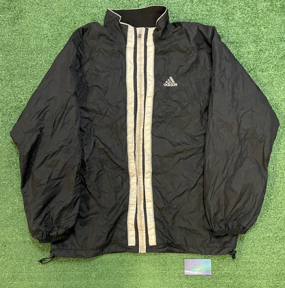 Vintage 1990s Adidas Three Stripes track jacket