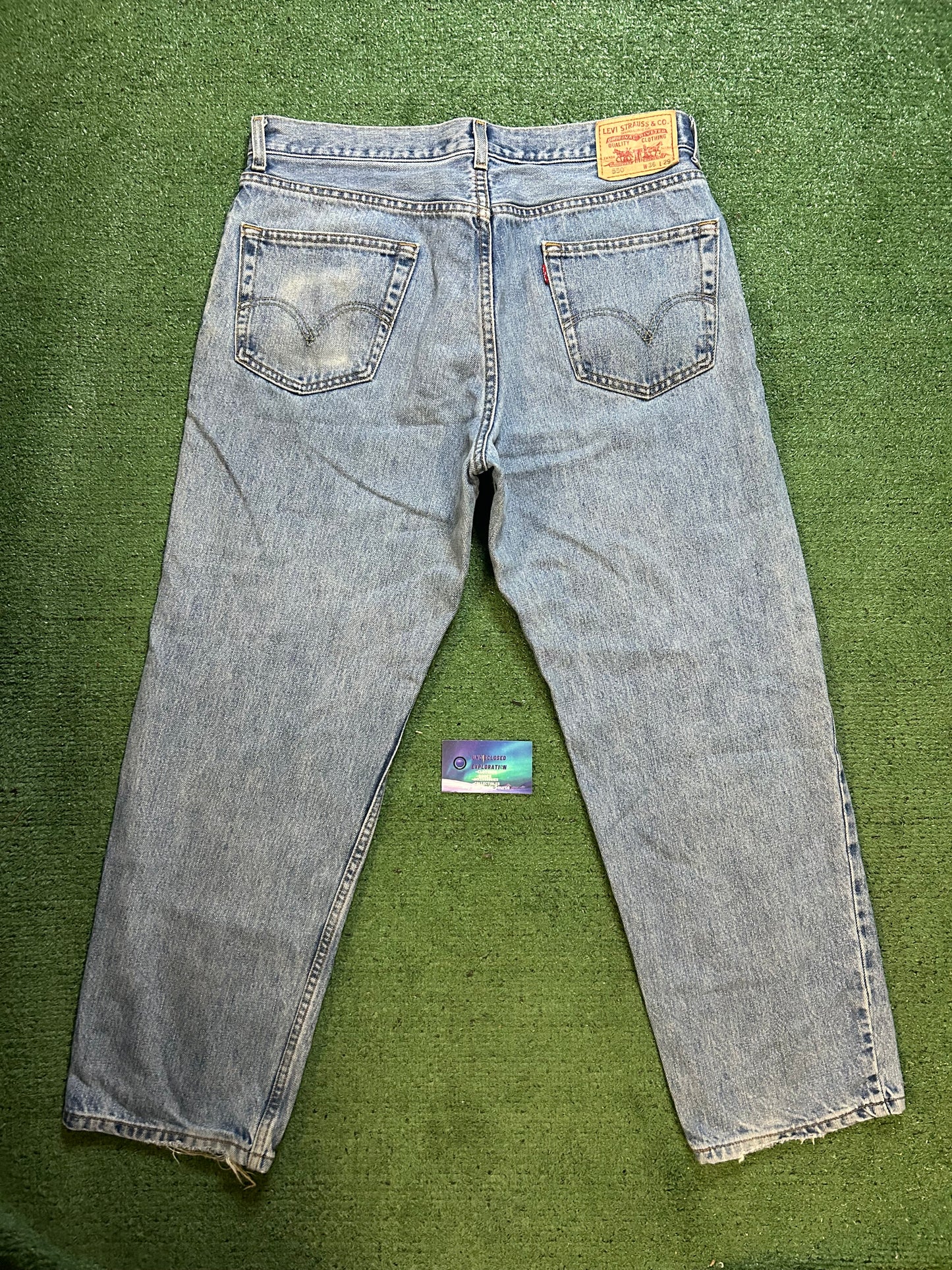 Levi 550 light wash jeans