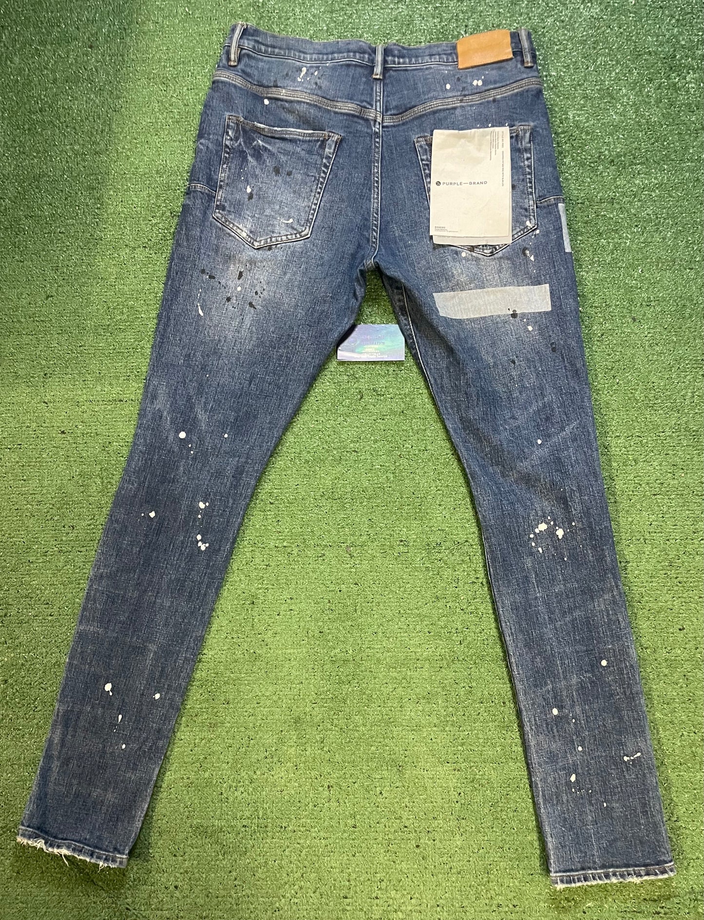 Purple Brand paint splatter jeans