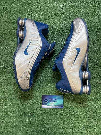 Nike shox blue and metallic silver 
size 9.5men/11women