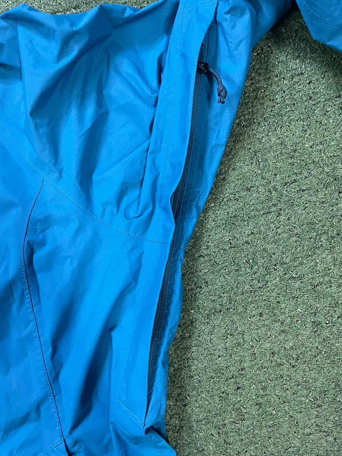 The North Face HyVent 2.5L turquoise jacket