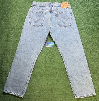 Vintage 1990s Levi 501 light wash jeans