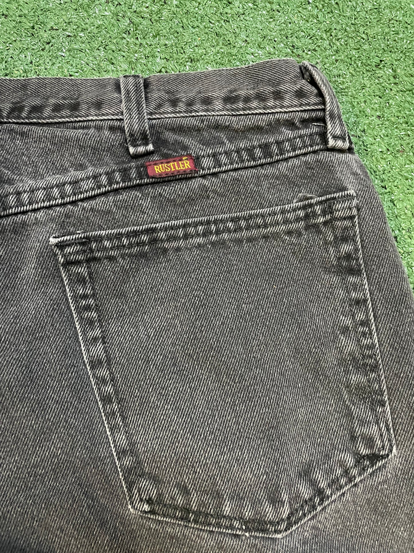 Black rustler black denim jeans