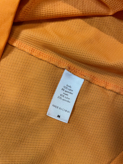 orange short sleeve zip up
