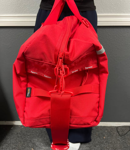 Supreme red duffle bag FW24