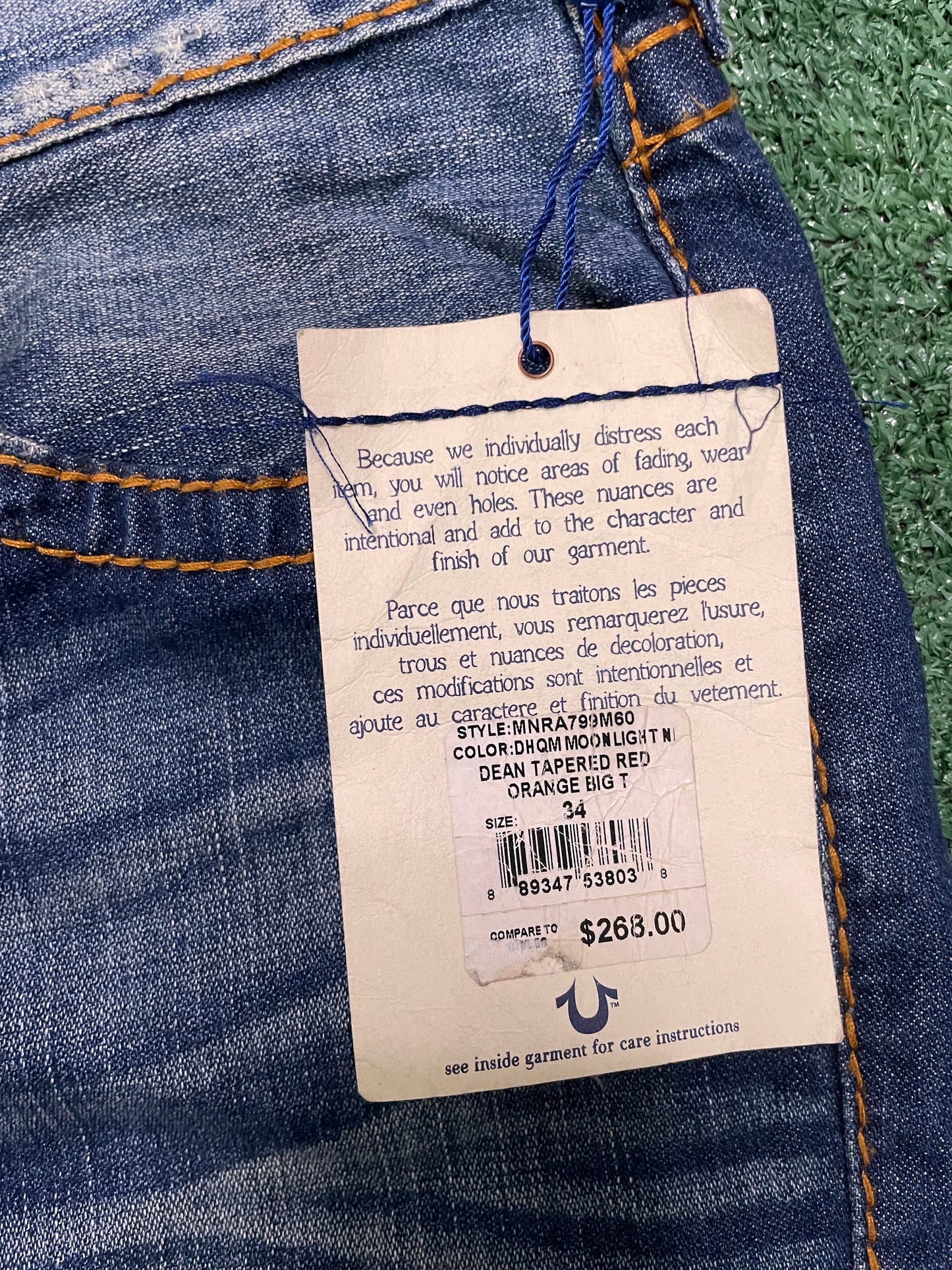 True Religion orange stitch jeans