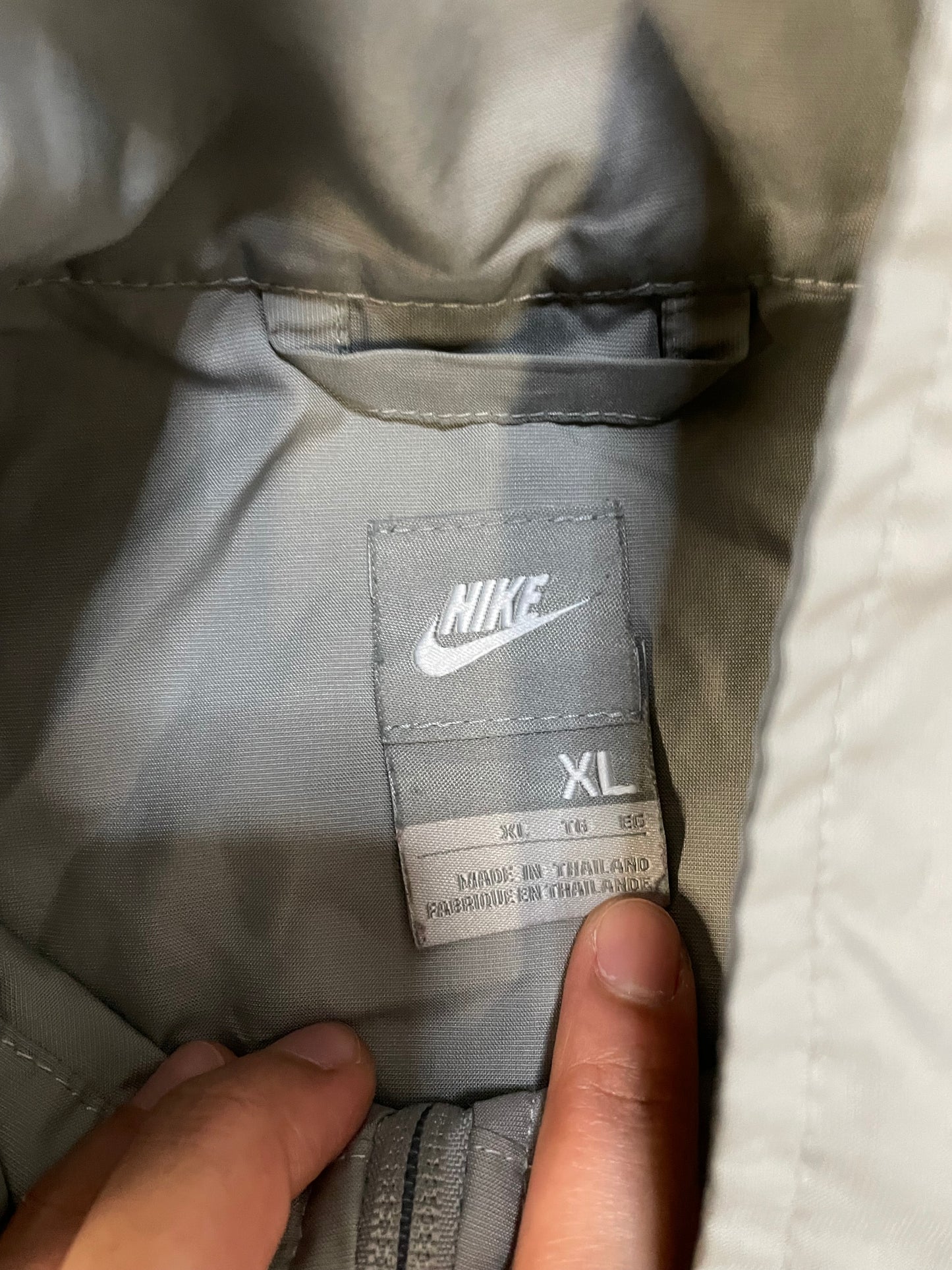 Vintage 2000s Nike silver windbreaker jacket