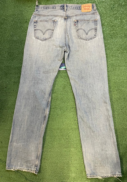 Levi 559 light wash distressed denim jeans