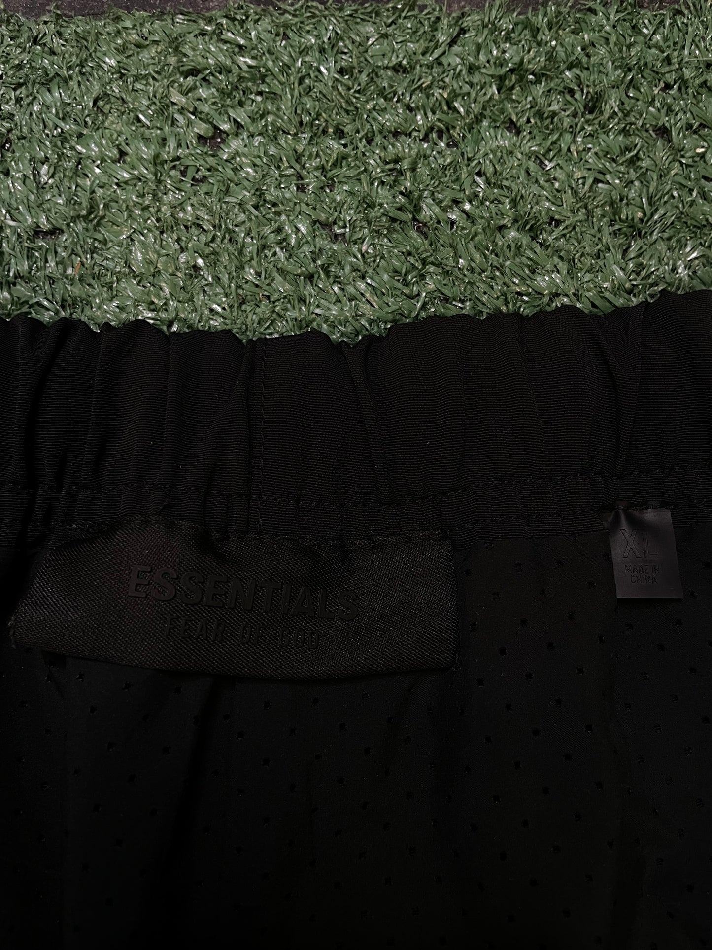 Fear of God Essentials black nylon track pants