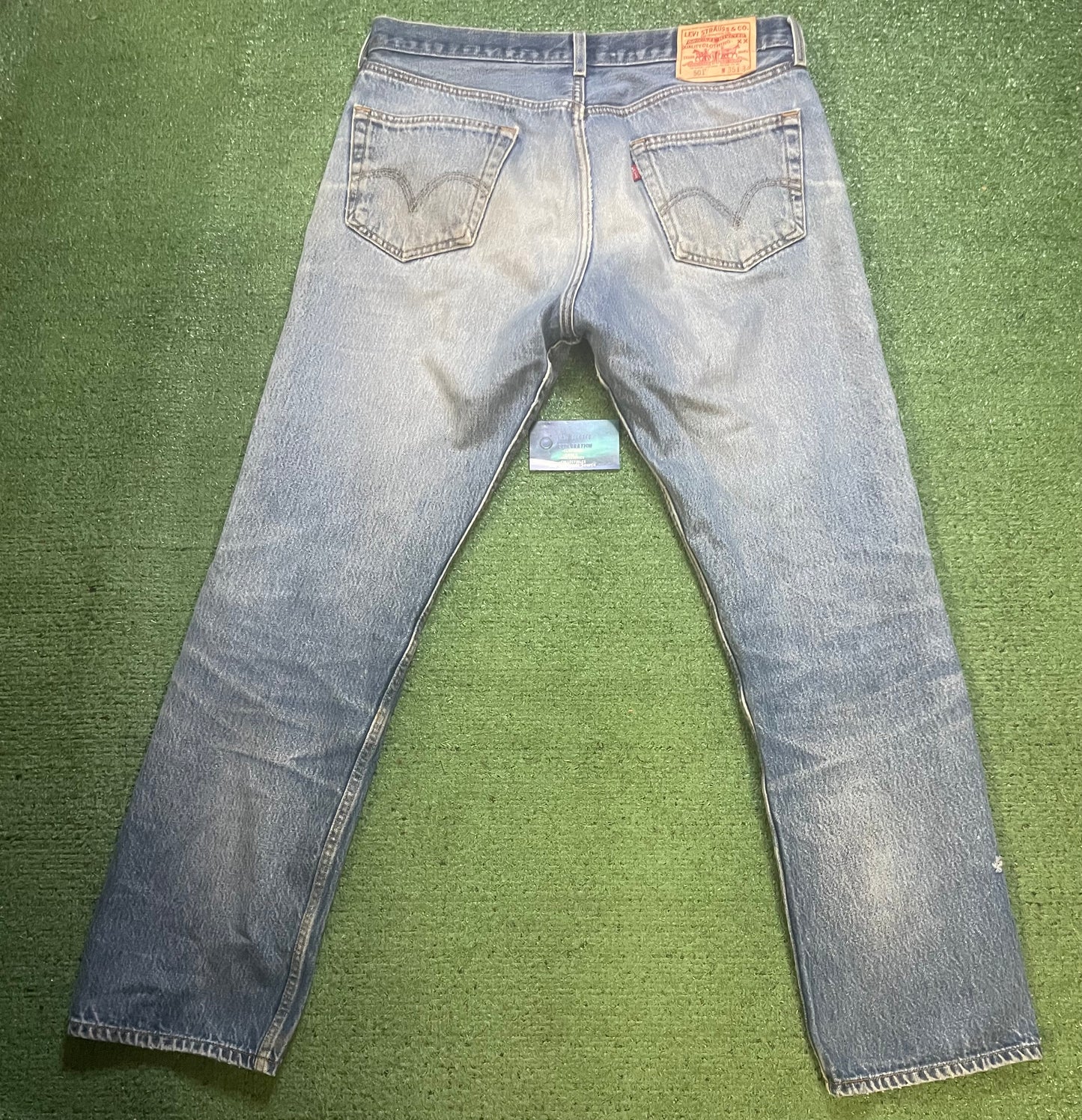 Vintage Levi 501 light wash distressed jeans
