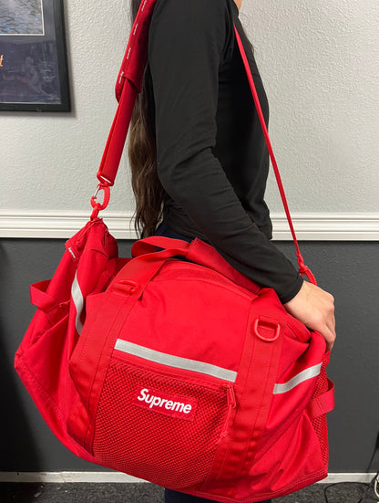 Supreme red duffle bag FW24