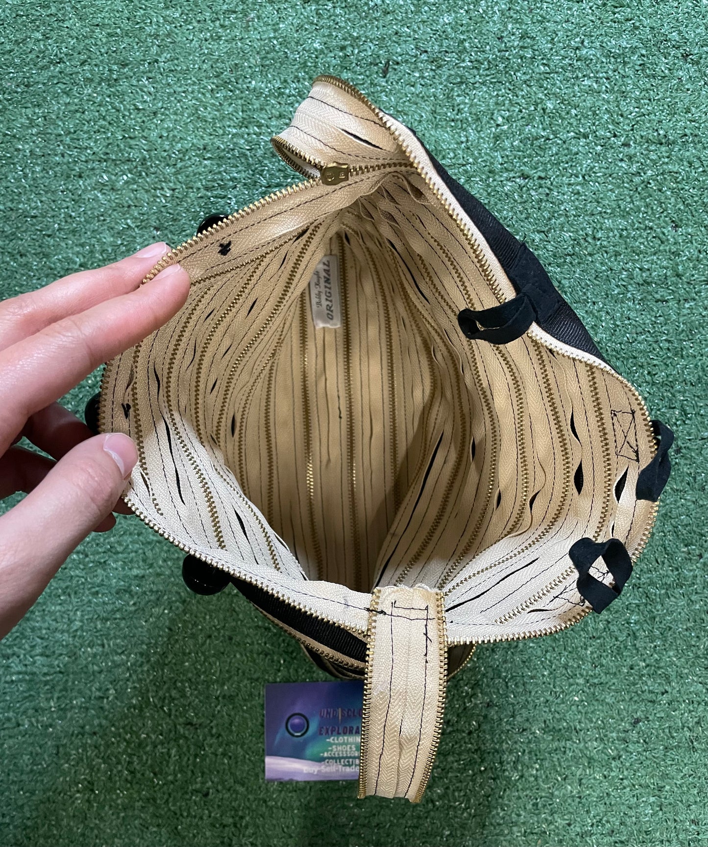 Black and cream all around zipper Purse