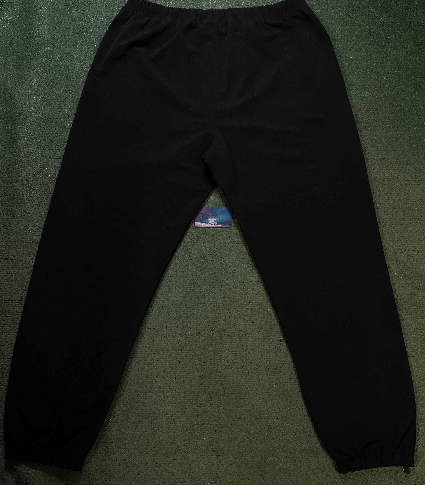 Fear of God Essentials black nylon track pants