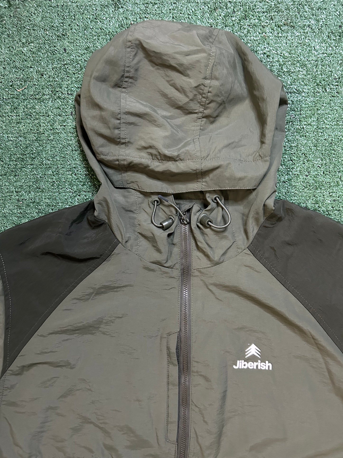 Jiberish olive green anorak jacket