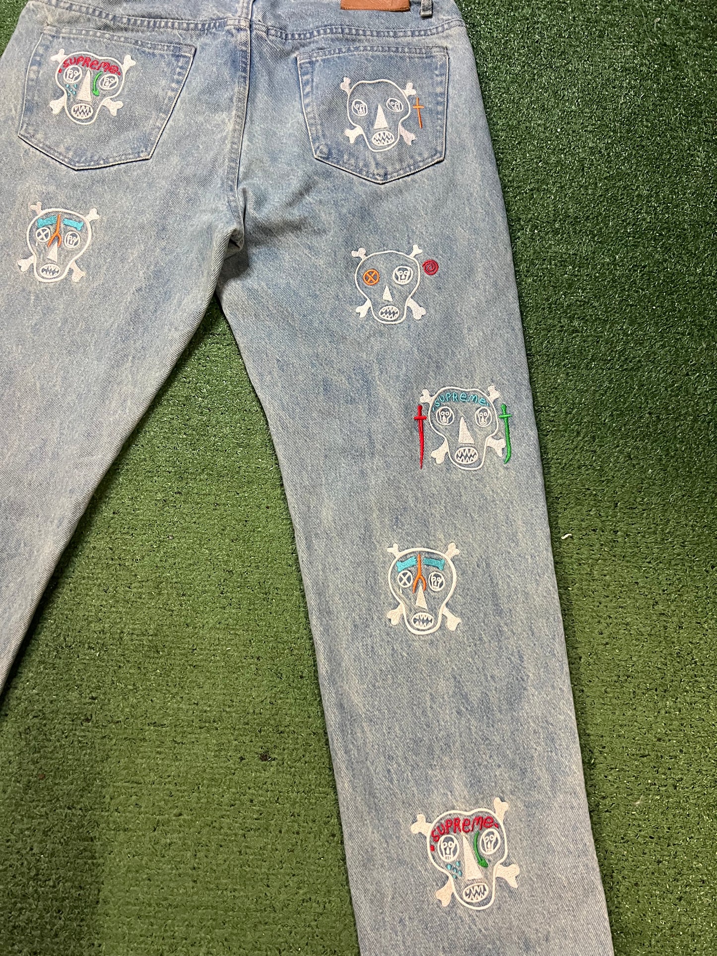 Supreme Clayton Patterson Skulls Embroidered light wash Jeans