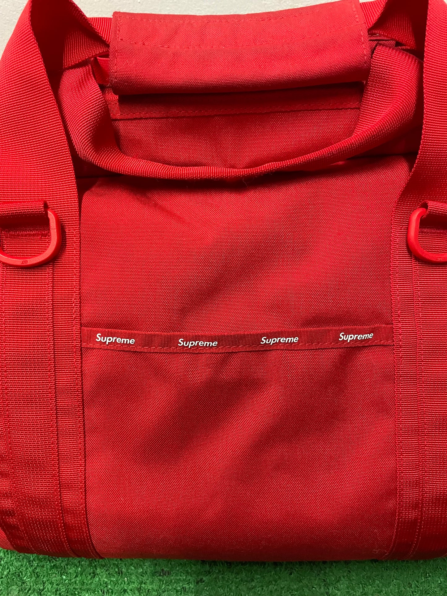 Supreme red duffle bag FW24
