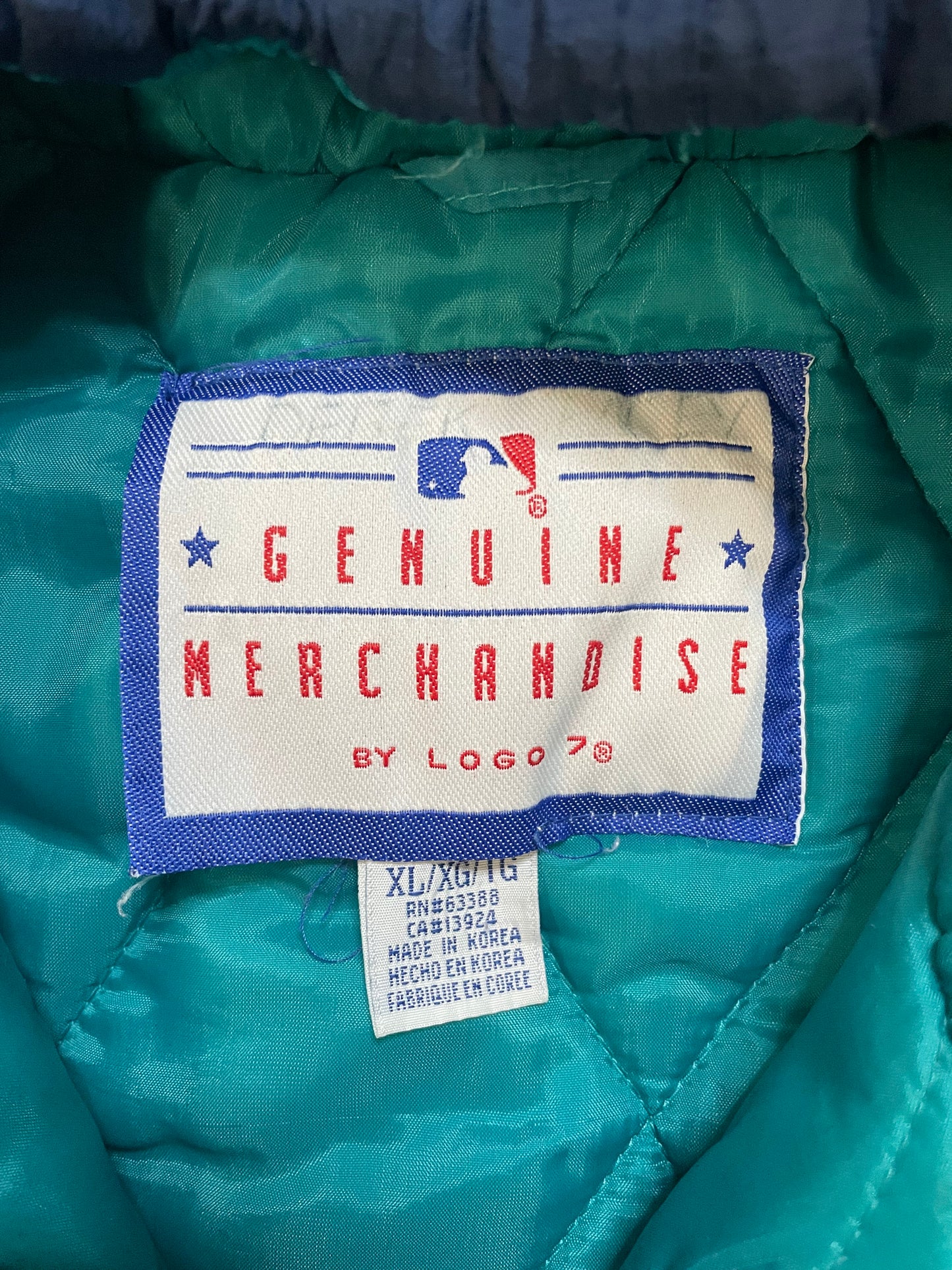 Vintage 1990s Seattle Mariners blue and teal puffer jacket