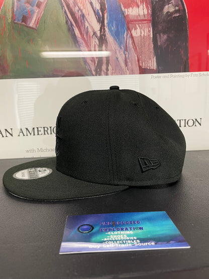 Seattle Mariners black on black new era hat