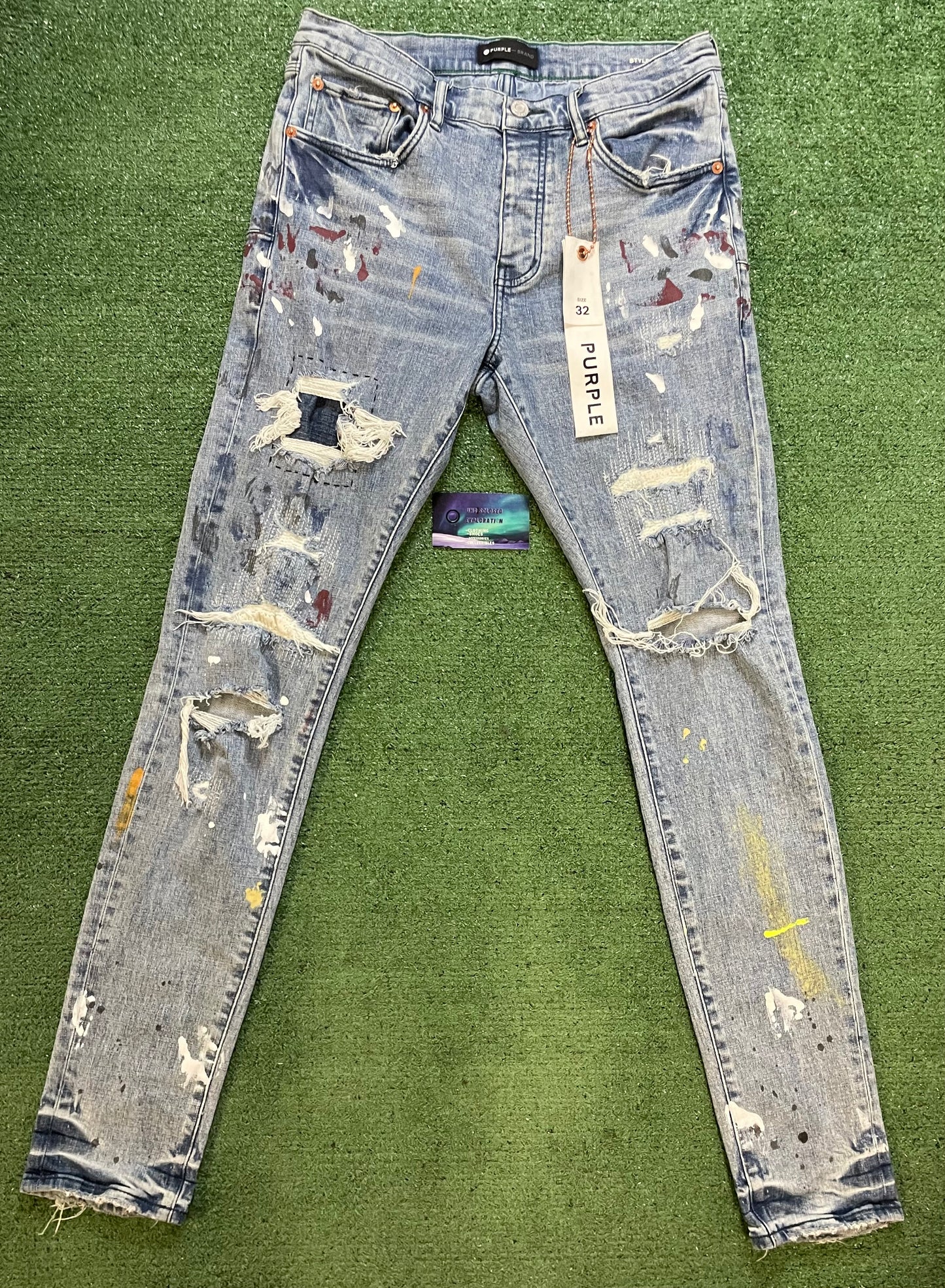 Purple brand paint splatter jeans