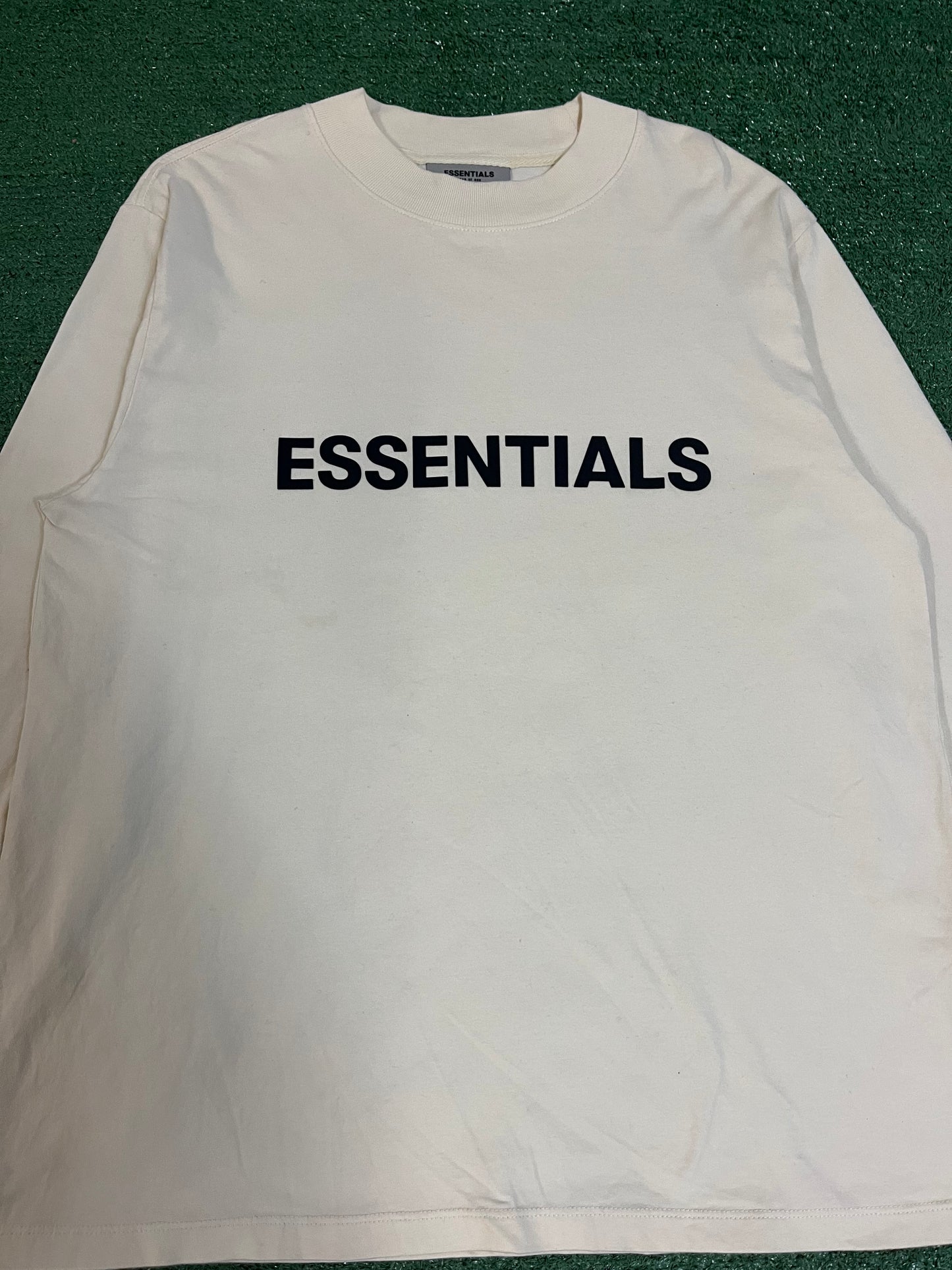 Fear of God Essentials long sleeve buttercream tee