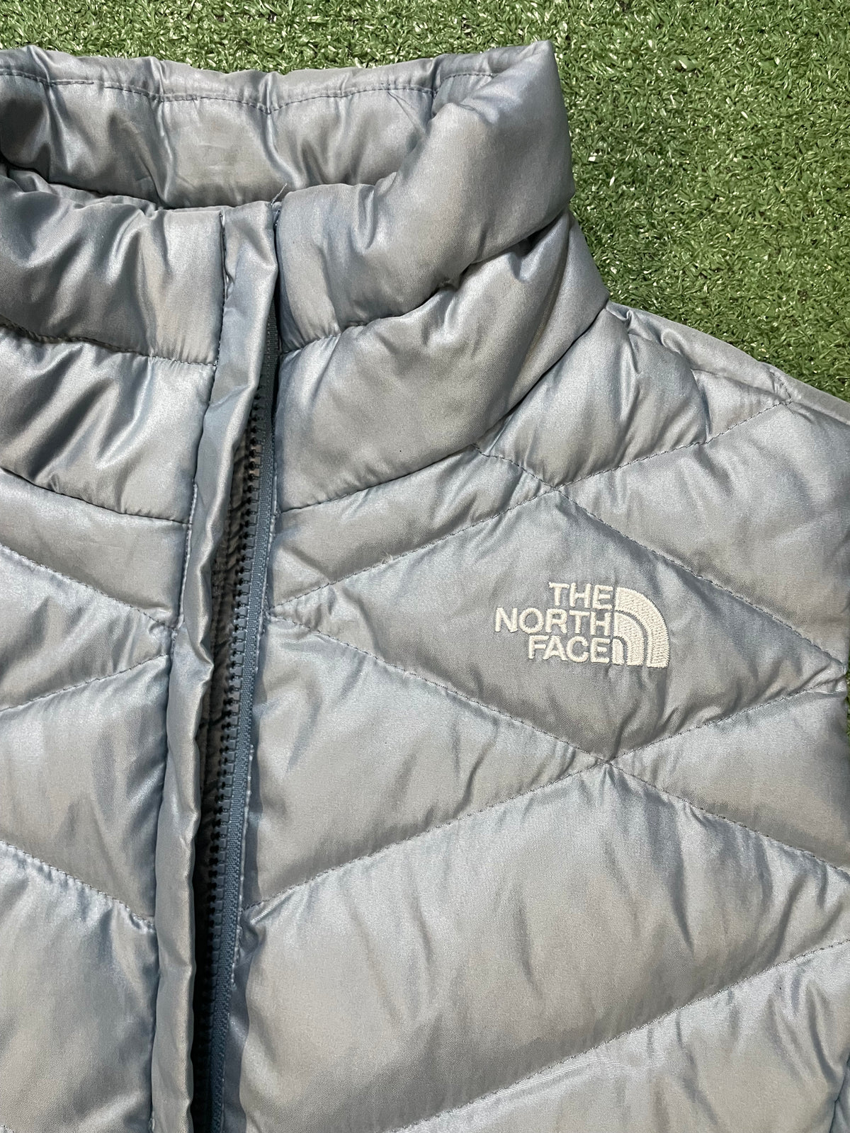 The North Face light blue 550 vest