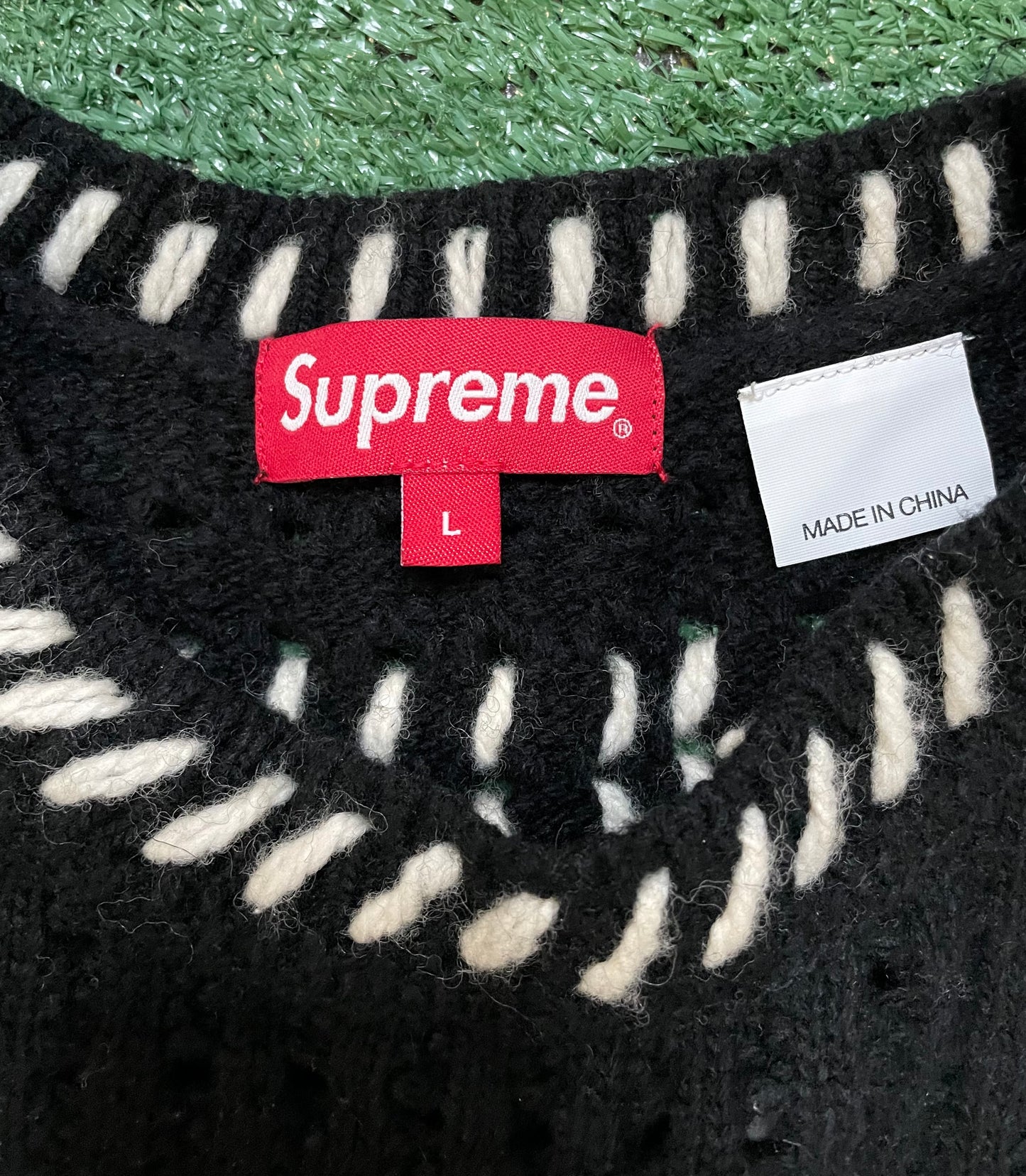 Supreme quilt stitch black sweater