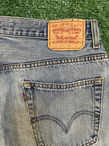 Levi 559 light wash distressed denim jeans