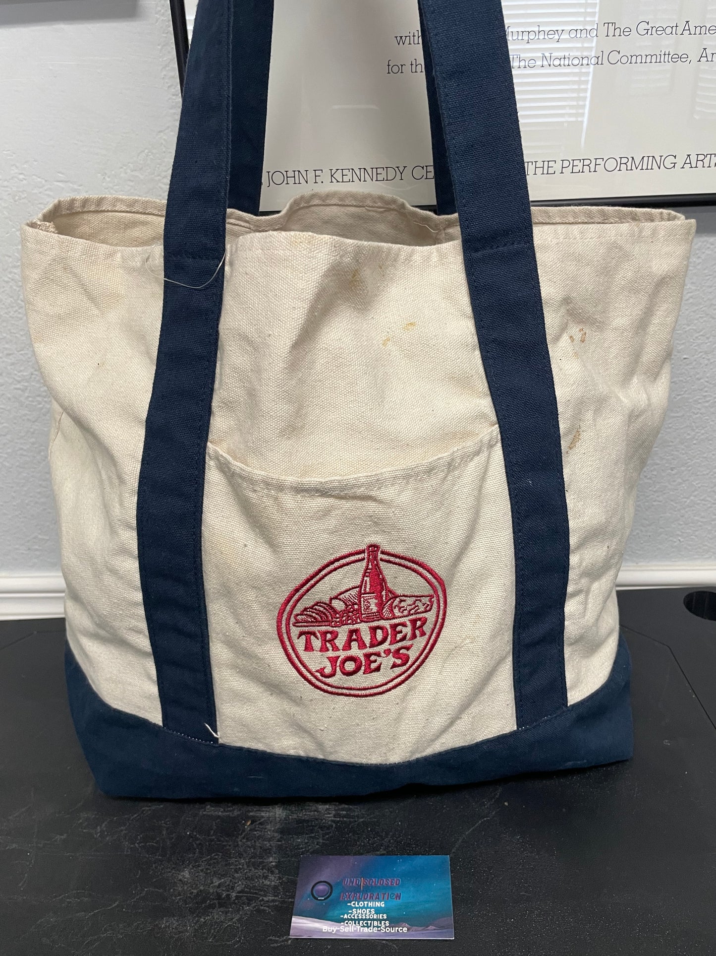 Trader Joe’s heavy duty cream and navy tote bag