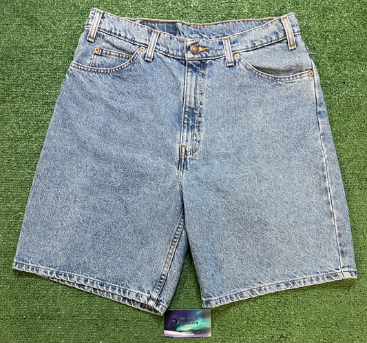Vintage 1990s Levi 550 orange tab Jean shorts