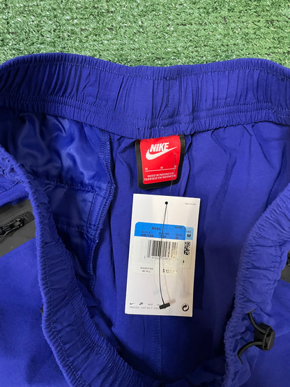 Nike tech woven blue pants
