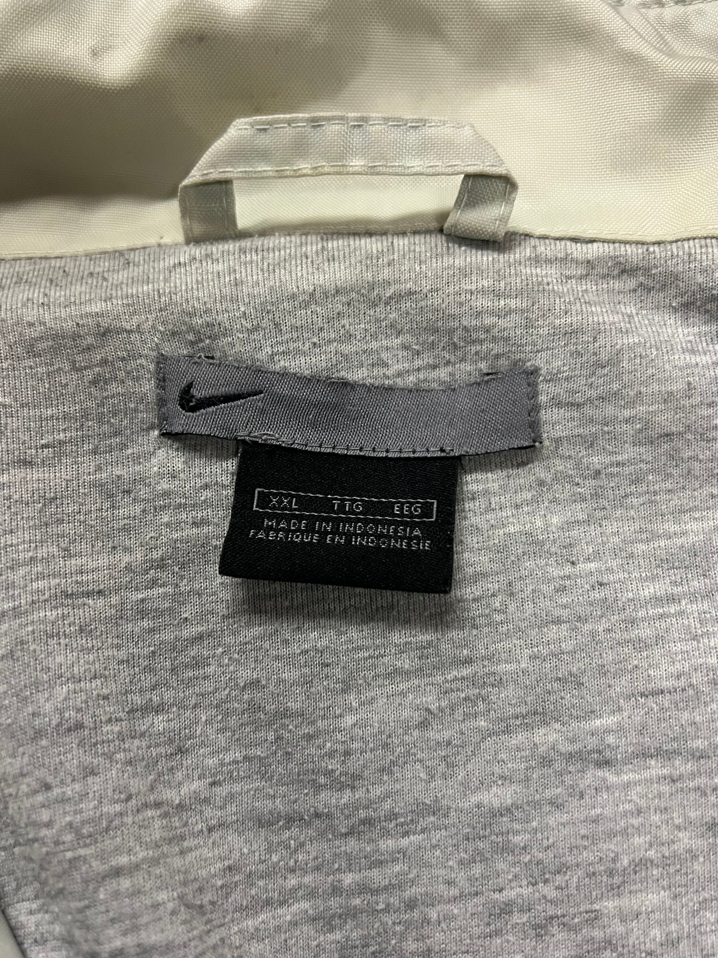 Vintage 1990s nike grey and navy blue windbreaker