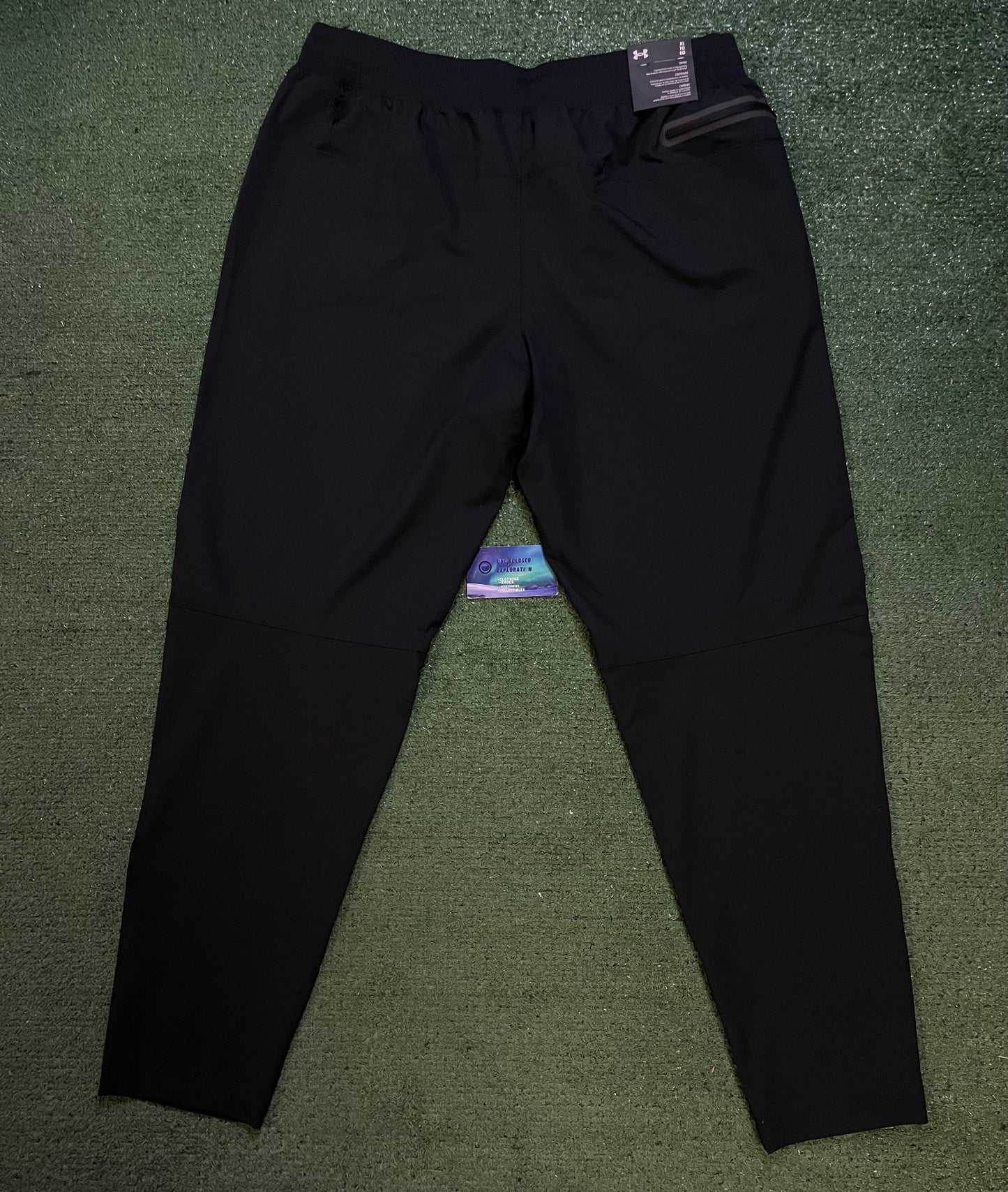 Under Armour woven sportswear taper pants