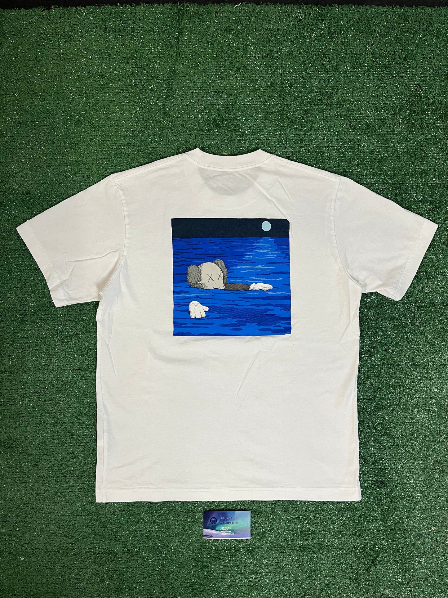 Kaws x Uniqlo floating artbook tee