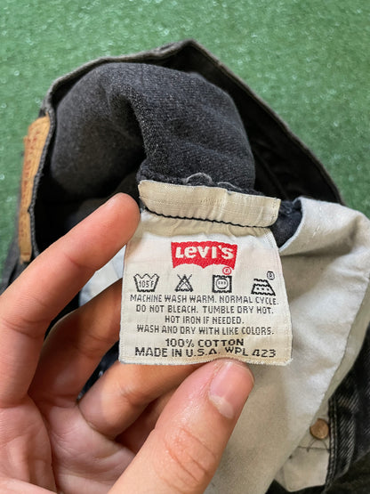 Vintage 1990s Levi’s 501 black faded jeans made in USA