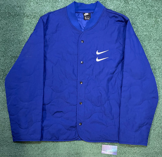 Nike swoosh quilted blue jacket