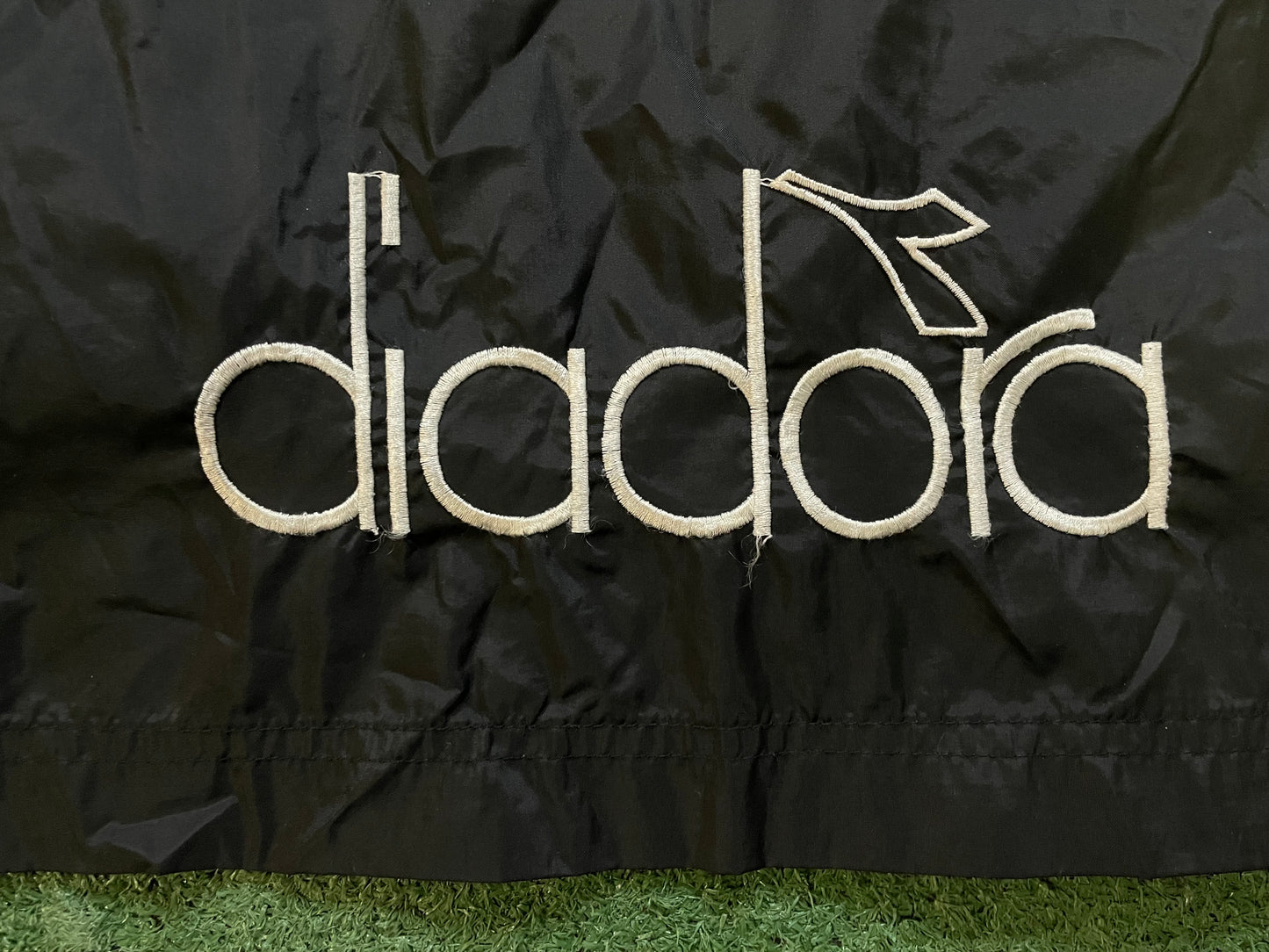 Vintage 1990s Diadora black and white windbreaker jacket