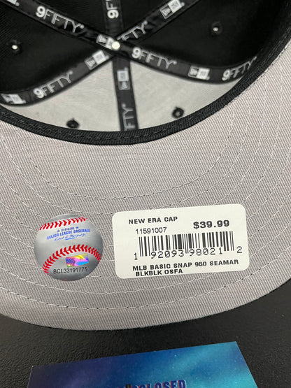 Seattle Mariners black on black new era hat