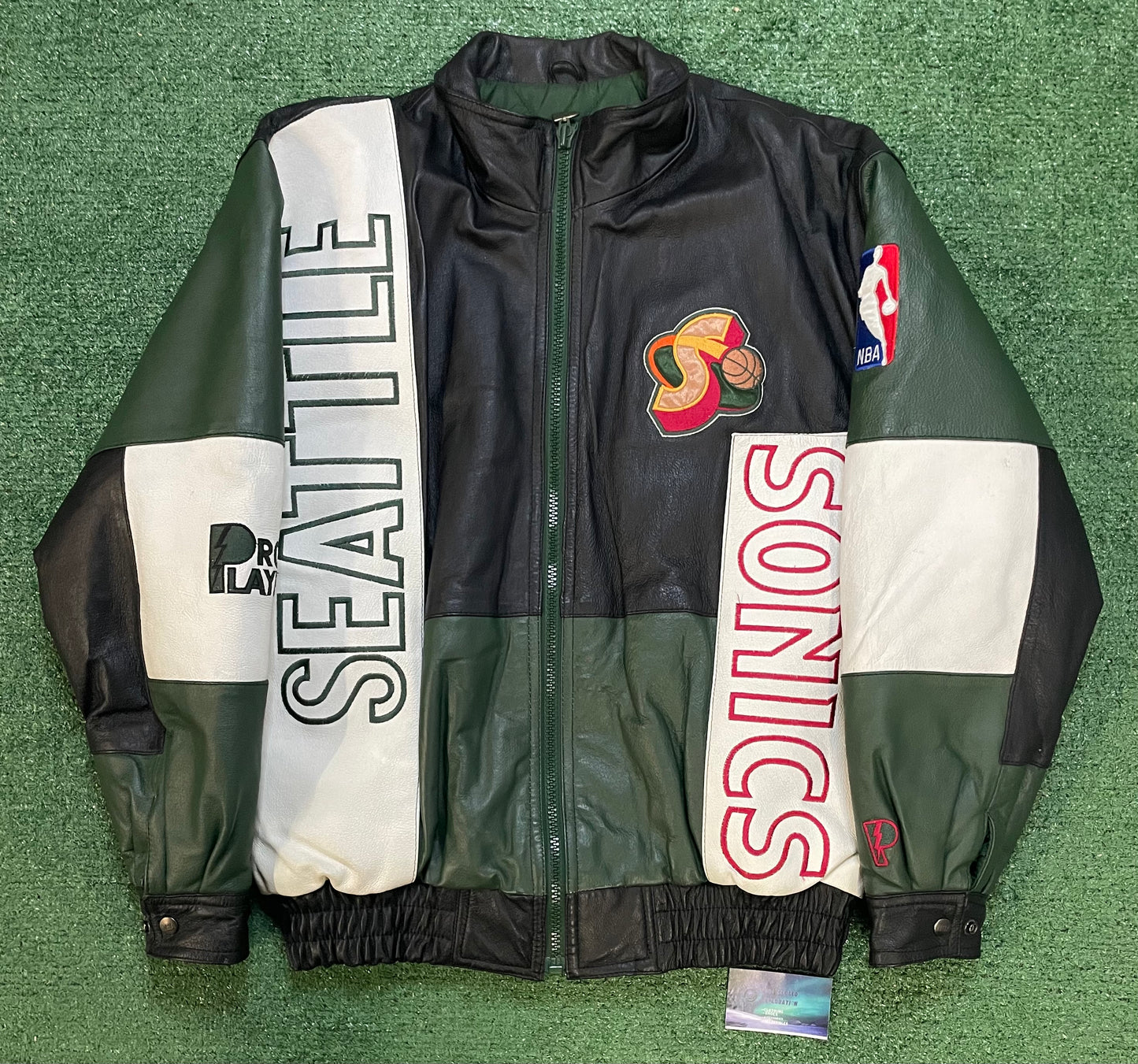 Vintage 1990s Seattle Sonics pro player Sonics jacket