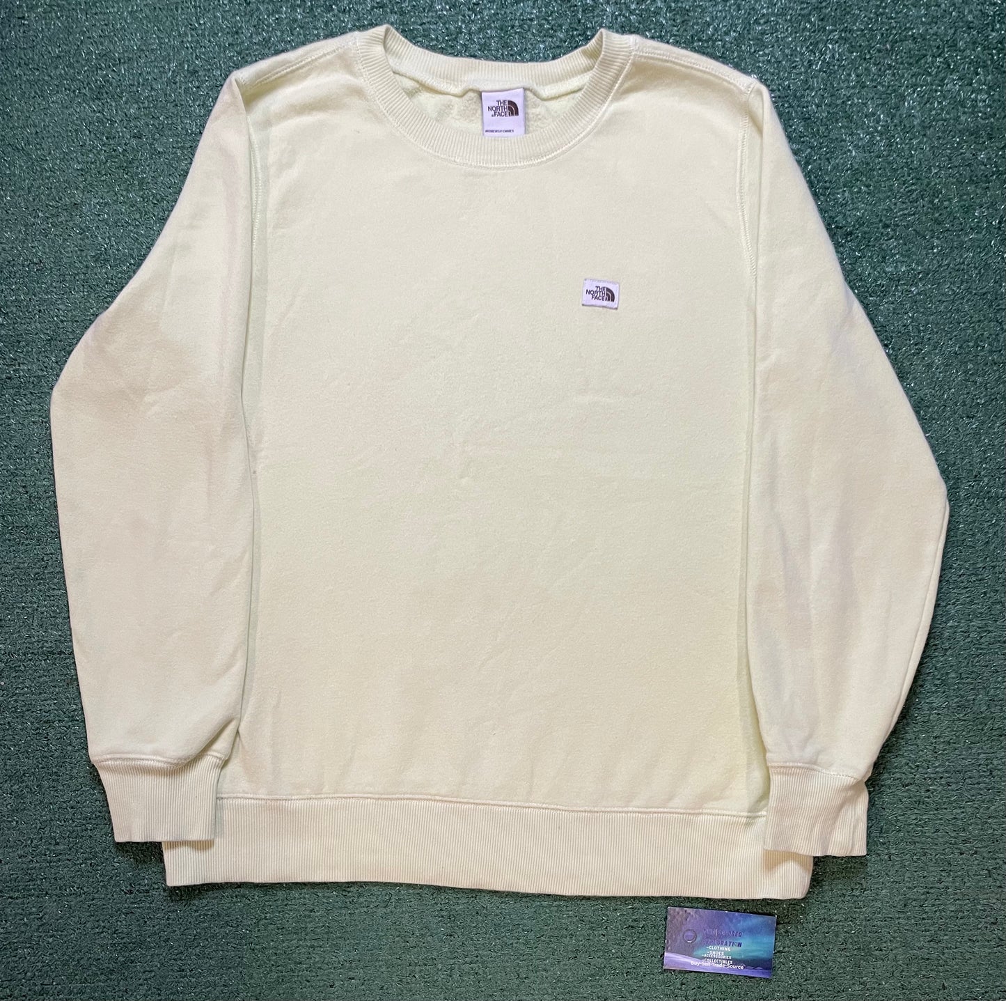 The North Face yellow crewneck
