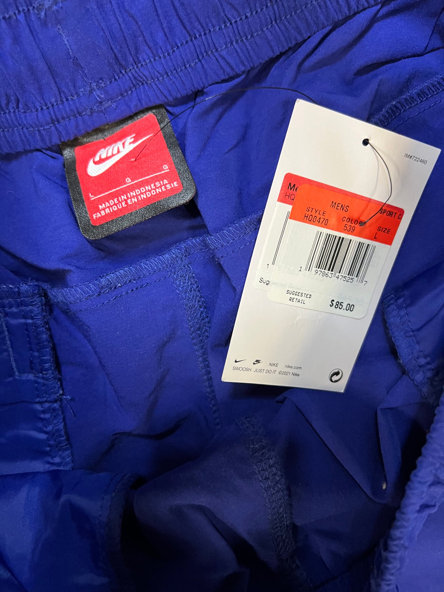Nike tech woven purple shorts
