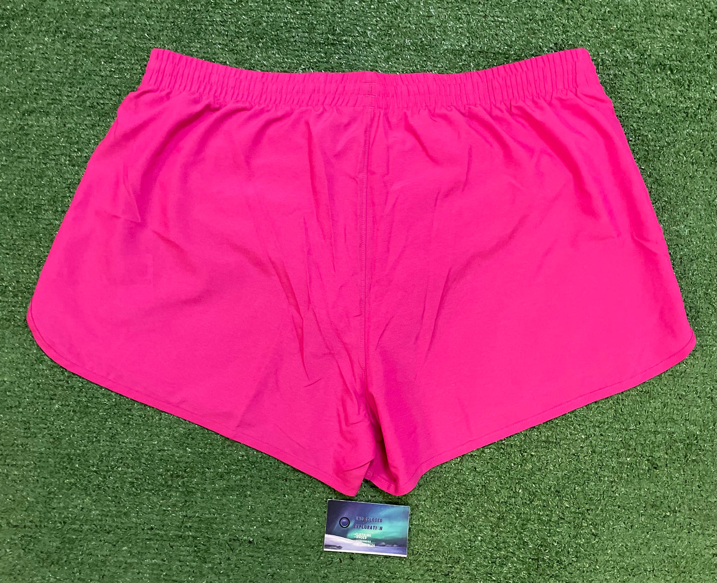 Under armour fly by pink shorts