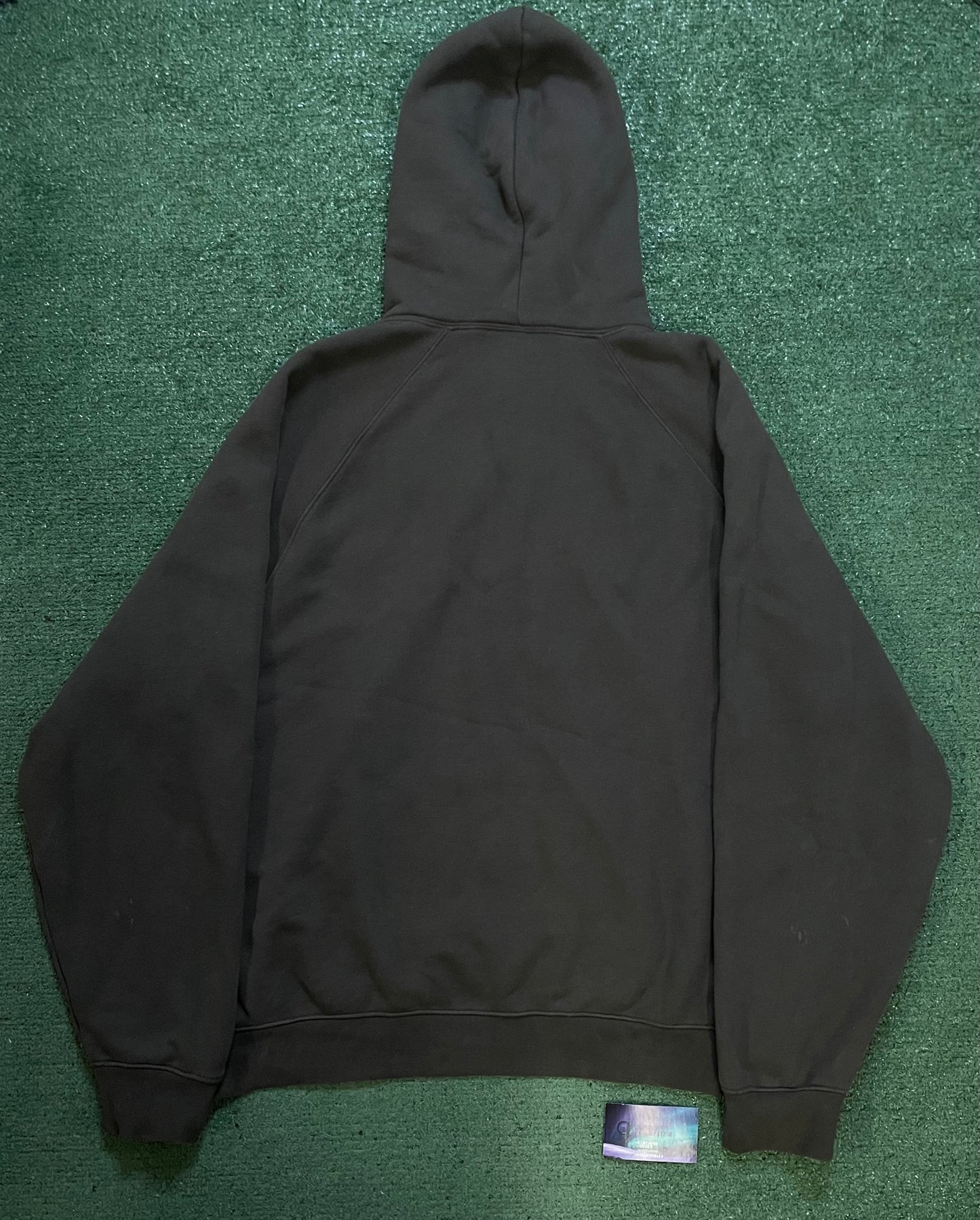 Fear of God Essentials off black hoodie