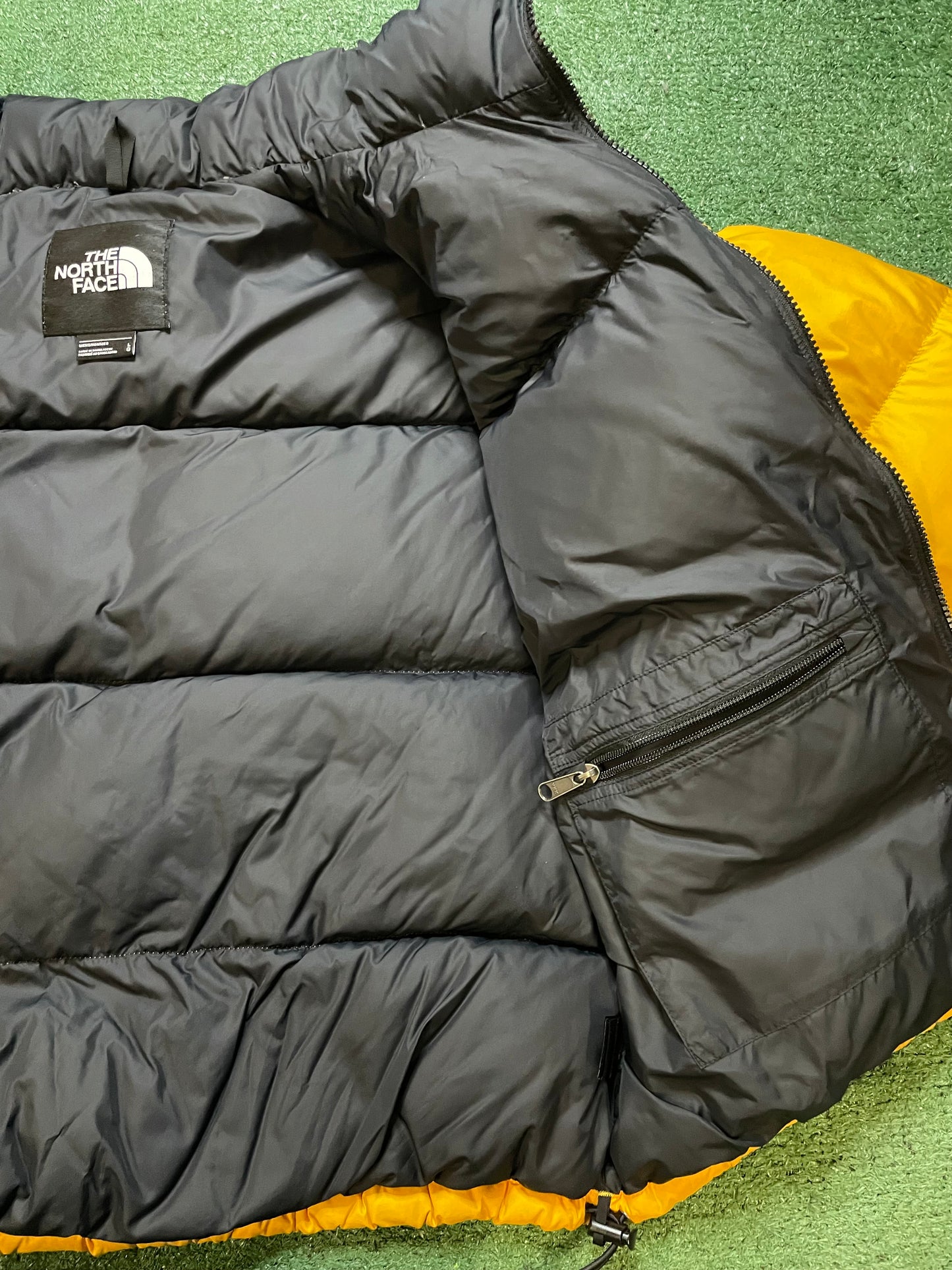 The North Face Nuptse 700 yellow jacket