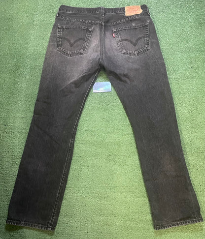 Vintage Levi’s 501 black distressed jeans