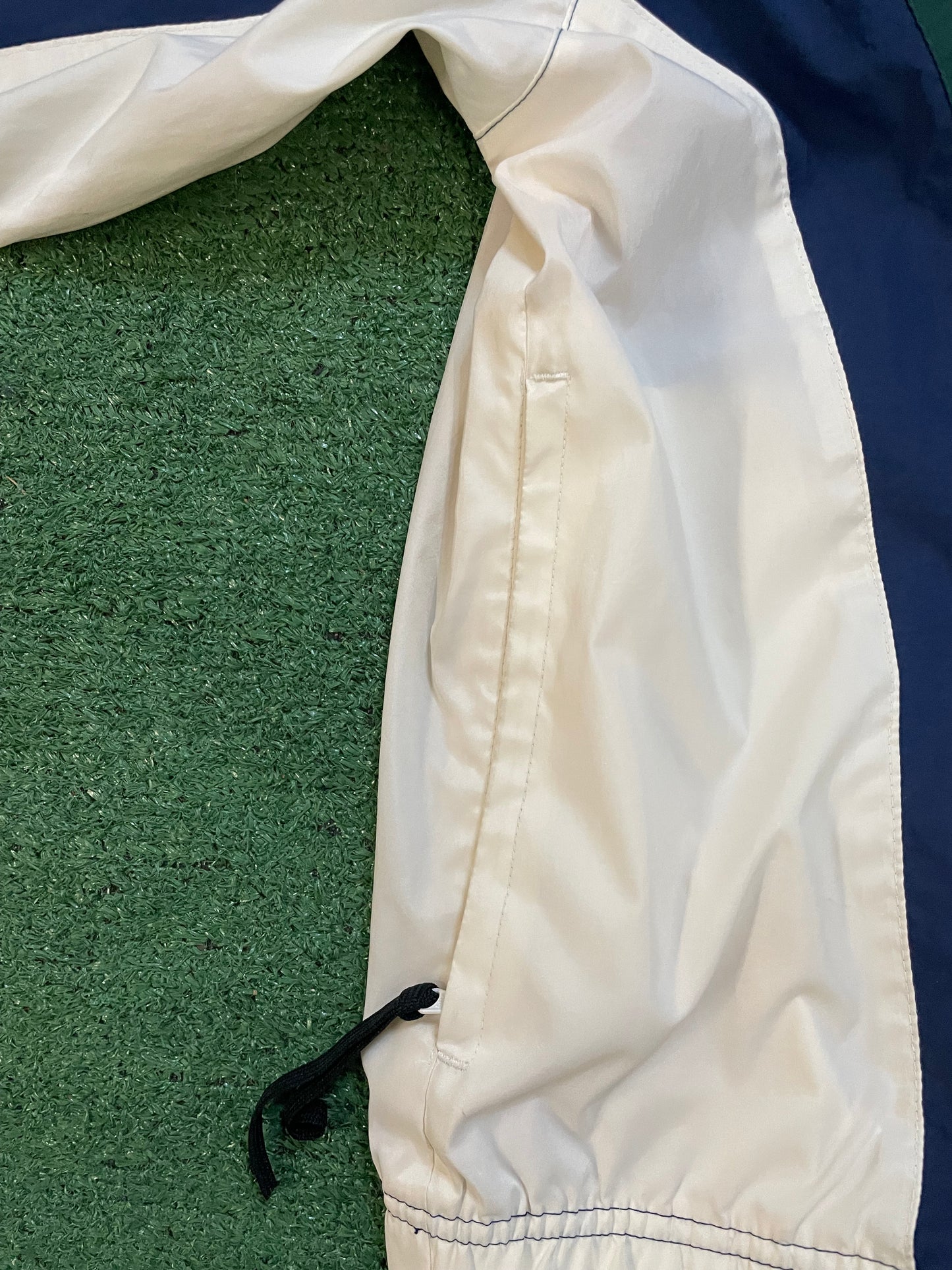 Vintage 1990s Nike blue green and white windbreaker jacket
