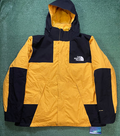 The North Face black & yellow mono mountain jacket