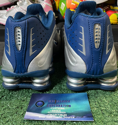 Nike shox blue and metallic silver 
size 9.5men/11women